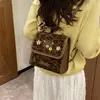 Mochila Retro Popular Bolso Estampado Leopardo Otoño Nuevo Bolso de Doble Hombro para Mujer 2026 Viaje Diario a la Universidad Estilo Simple de Moda Nicho