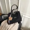 Novas Bolsas Populares Outono e Inverno 2025 Grande Capacidade Elegante Bolsa de Ombro para o Dia a Dia Bolsa Tote Casual Elegante de Braço