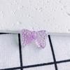 Acessórios para joias DIY atacado fofo transparente cor de doce mágico pingente de laço com furo reto brincos pingente de joia