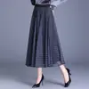 Falda plisada de malla a cuadros para mujer, nuevo estilo otoño/invierno 2026, que cubre la cadera, de longitud media, corte ajustado, línea A, falda con dobladillo ancho