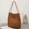 Bolsa feminina de couro bovino trançado Novo estilo coreano moderna de ombro moderna versátil grande capacidade debaixo do braço de couro bolsa feminina