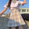 2024 nueva colección japonesa uniforme JK falda a cuadros traje de manga corta para mujer falda plisada uniforme escolar jk para estudiante venta al por mayor generación