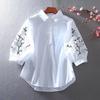 Primavera y Verano 2023 Nueva Camisa de Diseño Elegante Extranjero Casual Suelta con Manga Farol Artística y Flor Bordada para Mujer