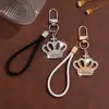 Llaveros europeos y americanos más vendidos transfronterizos, colgantes para bolsos, colgantes de moda con incrustaciones de diamantes, colgantes de corona personalizados de lujo, accesorios