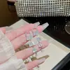 Pendientes geométricos exquisitos y elegantes con borlas para mujer, lujo ligero, alta gama, moda, pendientes de temperamento, pendientes de diseño de nicho, venta al por mayor