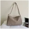 Nueva bolsa de mano grande de estilo casual para mujer de Shuai Mi, bolso de hombro simple de color liso para el día a día, bolso cruzado moderno