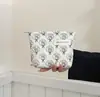Nova Bolsa Simples Acolchoada de Bolinhas para Batom de Mão Bolsa de Cosméticos Bolsa Pequena de Armazenamento Porta-Moedas Mini Bolsa de Mão Portátil