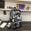 Mochila de Mujer Nueva Moda Estilo Japonés Personalidad Graffiti Mochila Escolar para Estudiante de Secundaria Mochila de Viaje Portátil para Estudiante Universitario Trendy