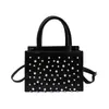 Bolsa de Nicho Estilo Motociclista para Mulheres Verão 2026 Nova Bolsa Quadrada Pequena com Rebites Bolsa de Ombro Fashion para o Dia a Dia Bolsa Transversal