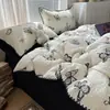Serie de Aguja Triangular Más Vendida Tacto de Algodón Súper Suave Hilo Esponjoso Juego de Cuatro Piezas Juego de Tres Piezas para Estudiante Ropa de Cama Dropshipping