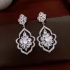 Pendientes Medievales de Flor Hueca con Diamantes, Retro, Exquisitos, de Alta Gama, Personalizados, Diseño Versátil para Mujer al por Mayor