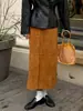 Saia midi feminina com textura retrô moderna 2026 outono e inverno nova saia reta estilo europeu e americano transfronteiriça com fivela de metal frontal