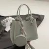 Bolso Cubo Sencillo de Mano 2026 Primavera Nuevo Estilo Coreano Moda Gran Capacidad Texturizado Colgante Hombro Cruzado