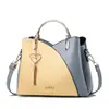 Bolso de mujer Taizhou 2024 nueva tendencia portátil coreano color de contraste gran capacidad moda hombro bandolera una generación de pelo