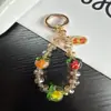 Corrente de celular com design exclusivo com contas de persimmon de vidro, alça pendente de charm de persimmon estilo vintage artístico