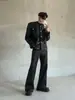 Pantalones casuales punk de cuero PU de alta gama con diseño deconstruido único para hombre, pantalones largos elegantes y modernos de otoño