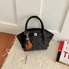 Bolsa de viaje transfronteriza para mujer, nuevo estilo 2026, bolso de hombro versátil, bolso de mano de moda a cuadros y lunares