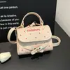 Bolso Cuadrado Pequeño Único de Lunares para Mujer, Nuevo Estilo Primavera 2026, Bolso de Hombro Cruzado de Alta Gama y Elegante, Bolso para Teléfono, Bolso de Mano Pequeño