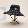 Sombrero nuevo de ala ancha para primavera y verano, sombrero de sol con estampado de letras, sombrero de sol para exteriores, sombrero de playa con cuerda a prueba de viento, sombrero de cubo, sombrero de pescador