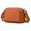 Bolso cruzado de hombro único de tela Oxford para mujer, nuevo de moda casual Primavera y Verano 2026, bolsa de cosméticos de nailon, bolsa de lona para mamá