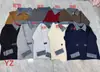 Cárdigan de punto patchwork de mezclilla estilo europeo otoño/invierno 2026 con solapa, cremallera y bloques de color, chaqueta suéter suelta y versátil para mujer