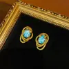 Pendientes de Bronce Antiguo Estilo Occidental Chapado en Oro Retro de 18 Quilates con Piedra Natural Azul y Blanca Diseño de Piedra con Forma de Serpiente