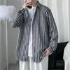 Camisa de manga larga de otoño estilo americano para hombre, moderna y genial estilo coreano, estilo nicho de Hong Kong, camisa floral de corte holgado, disponible para dropshipping