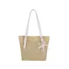 Bolso de Hombro Único para Axila de Playa 2026 Colgante Elegante Tejido de Paja Verano Nuevo Gran Capacidad Vacaciones en la Costa Bolso Tote Tejido