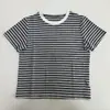 Camiseta de otoño nueva, casual, de rayas, manga corta, transpirable, para uso diario, para mujer, adecuada para ir al trabajo, con cuello redondo, corte holgado, top versátil y favorecedor.