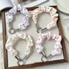Fábrica grande de Yiwu verano nuevo estilo coreano exquisito hebilla plana scrunchie plisado cadena para teléfono colgante para teléfono llavero