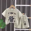 Ropa de verano para niños y niñas traje infantil nuevo para niños medianos y pequeños bebé estilo occidental niños oso astronauta manga corta traje casual