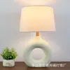 Lámpara de mesa de olla de cerámica estilo Qiji Habitación Modelo Hotel B&B Lámparas de diseñador Dormitorio Mesita de noche Adornos decorativos chinos nuevos