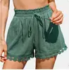 2025 Moda Femenina Europea y Americana Primavera y Verano Nuevo Encaje Adornado Playa Casual Suelto Cordones Pantalones Cortos