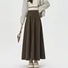 Foto real de falda de lana para mujer, nuevo estilo otoño e invierno 2026, falda de paraguas plisada de longitud media, falda larga de cintura alta línea A
