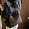 Bolso de axila retro de alta gama para mujer, nuevo bolso de hombro tipo cubo versátil de moda de verano para el día a día