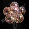 Procesando puesto de globos de lentejuelas personalizado de 12 pulgadas suministro globo de juguete para niños color papel globo transparente