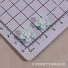 Mini Creativo Nuevo Flor de Cinco Pétalos Accesorios de Resina DIY Pegamento de Crema Funda de Teléfono Pasador Accesorios para el Cabello Llavero Venta al por Mayor