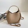 Bolsa de mão com textura de tendência transfronteiriça, bolsa tipo balde, bolsa feminina, novo verão 2026, cor sólida, corrente, bolsa de ombro único, bolsa tiracolo mãe-filho