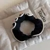 Estilo Francés Chanel Borde Blanco Perla Anillo Intestino Grueso Cuerda para el Cabello Elegante Todo Fósforo Cabeza de Bola Anillo de Cabello de Alta Elasticidad Tocado Accesorios para el Cabello