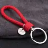 Al por Mayor Punto Creativo Cuerda de Cuero Trenzada Círculo Único Llavero Muñeca Bola de Pelo Llavero Accesorios para Llaves Joyería