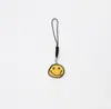 Llavero de cara sonriente de color aleación con goteo transfronterizo de comercio electrónico, accesorios de colgante para bolso con expresión irregular chapado en oro
