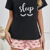 Shorts Pretos Curtos de Manga Curta Europeus e Americanos Transfronteiriços para Mulheres, Pijama Respirável Exportado de Tamanho Grande com Gola Redonda para Mulheres, Roupa Casual para Casa