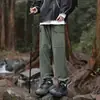 Nuevos pantalones de trabajo de primavera y otoño para hombre, pantalones deportivos casuales multipocket estilo Hong Kong para pareja de otoño e invierno, admite impresión personalizada
