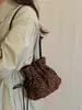 Bolso de la suerte de ante con estampado de leopardo de alta gama 2026 nuevo estilo vintage bolso de hombro bolso cubo plisado otoño e invierno bolso cruzado