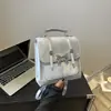 Comercio exterior al por mayor hermosa casual pequeña mariposa portátil hombro mujer bolso nuevo bolso de hombro bandolera pequeño cuadrado