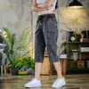 Pantalones cortos de hombre transfronterizos, nuevo estilo verano 2026, shorts casuales transpirables de seda helada, pantalones rectos de longitud media modernos y únicos para hombre