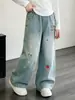 Nova coleção de outono: Calça jeans larga bordada em estilo cartoon para meninas, de corte solto, fluida e comprida, um estilo casual e moderno para crianças mais velhas