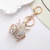 Amazon Transfronterizo Popular Llavero de Escarabajo Mariquita de Siete Estrellas Anillo de Llavero de Metal con Pedrería Colgante para Mochila