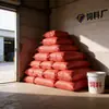 Bolsa de embalaje para mudanza de logística express de plástico PP rojo brillante fábrica venta al por mayor bolsa tejida piel de serpiente saco bolsa para pienso