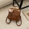 Mochila de Viagem Retro Estilo Britânico para Mulheres Inverno 2025 Nova de Aparência Elegante Simples Casual para Passeio